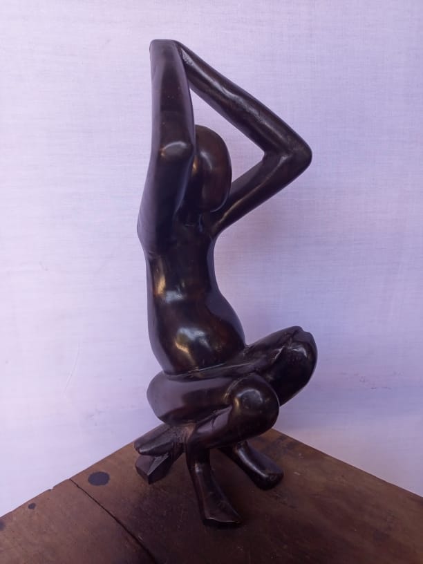 African Man Sculpture. Mpingo wood sculpture.